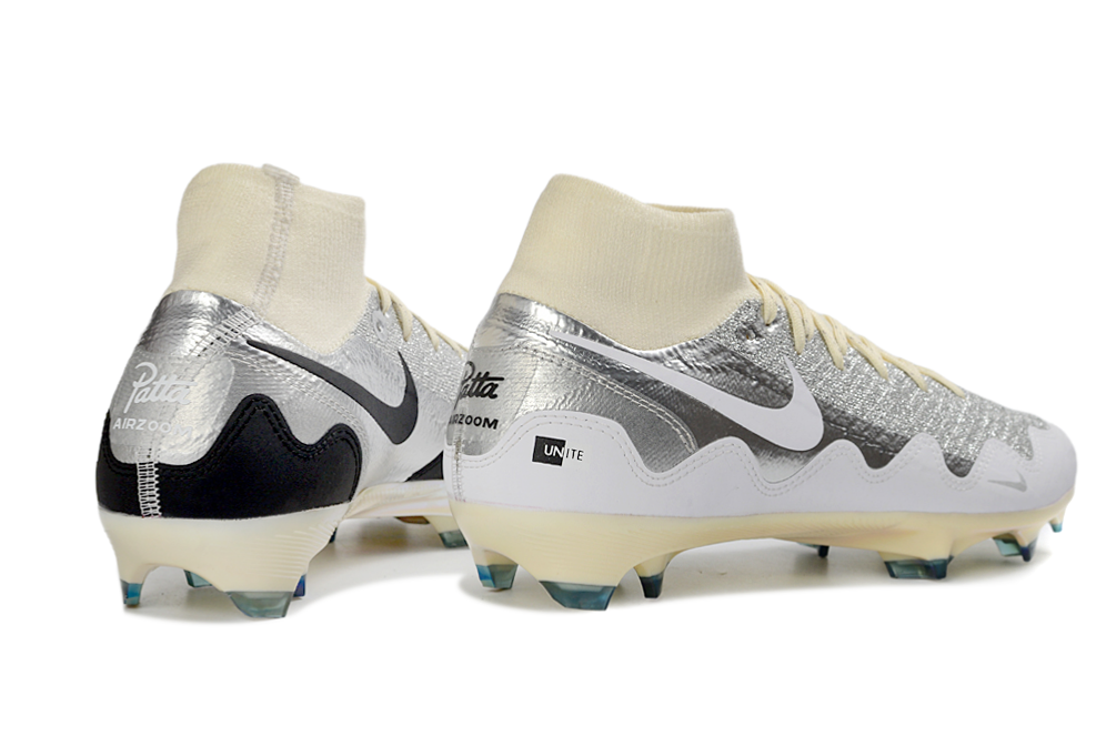 Back view of Nike Air Zoom Mercurial Superfly X Elite FG soccer cleats with White Waves and Patta design