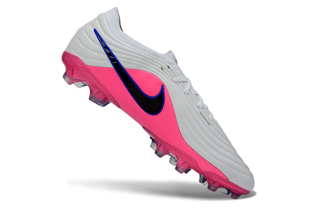 Football player wearing Nike Tiempo Legend Maestro Elite FG football boot in action