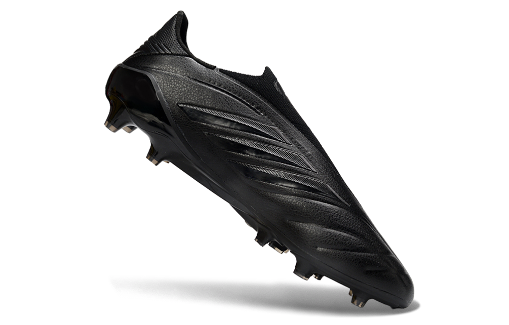 Adidas Copa Pure IV Elite Laceless FG football cleat in action on the field