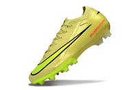 Close-up of Nike Mercurial Vapor XVI Elite football boot, designed for elite performance on artificial grass.