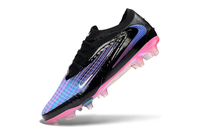 Nike Phantom 6 Elite Firm Ground Soccer Cleats on a grass field.