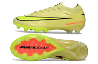 Back of Nike Mercurial Vapor XVI Elite football boot, designed for elite performance on artificial grass surfaces.